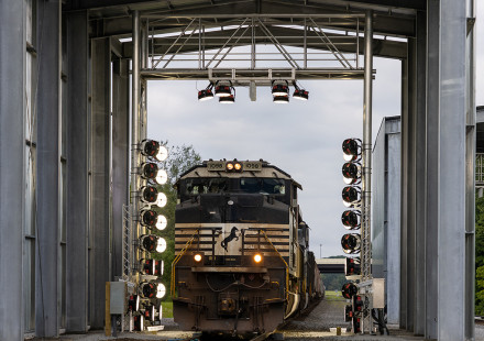 photo of train passing through portal structure
