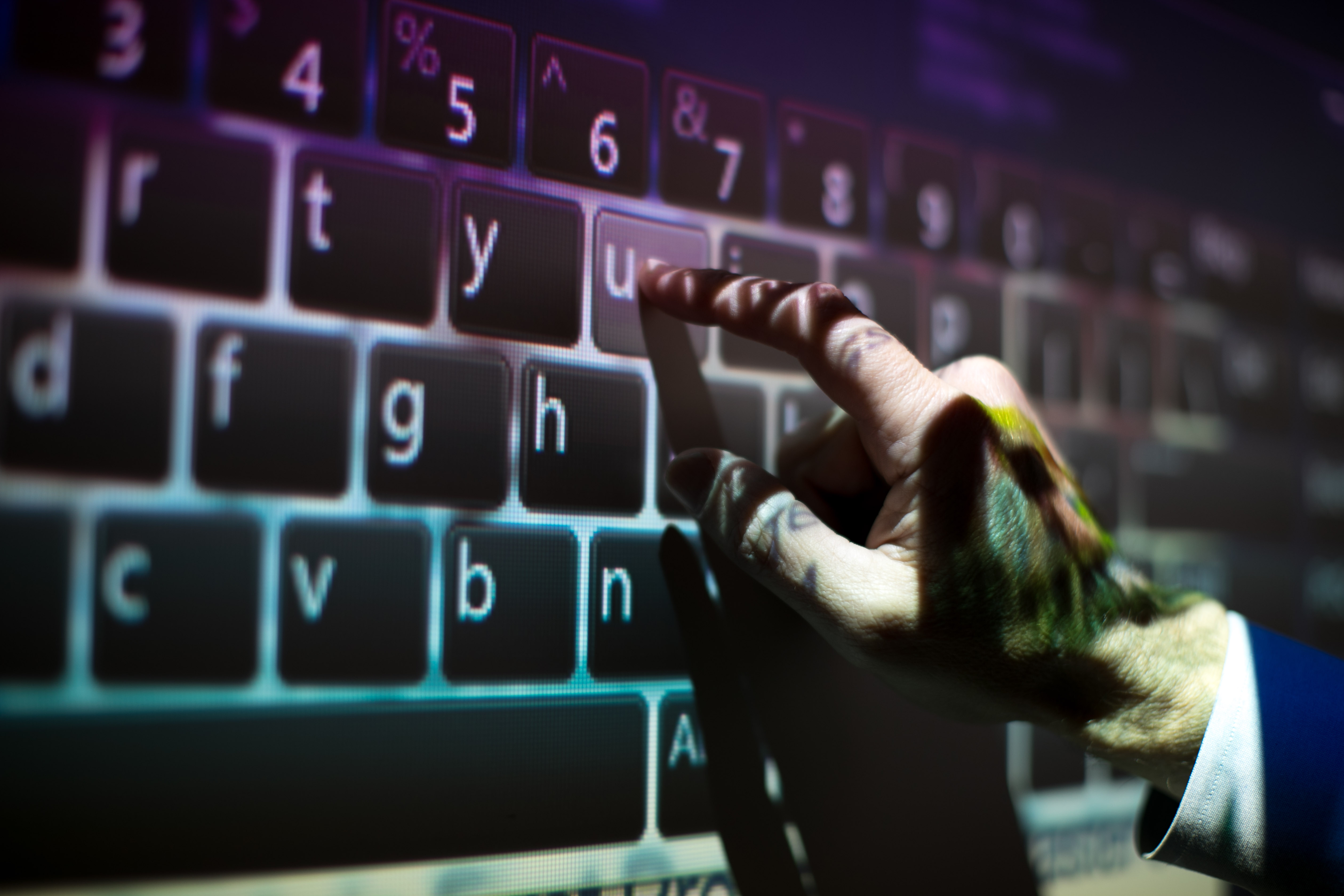 Hand typing on keyboard