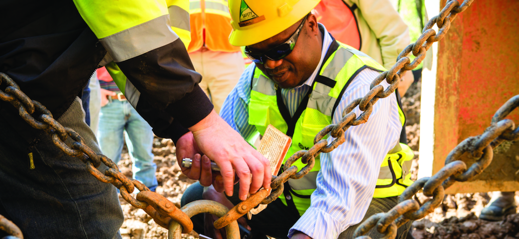 Man with hard had on construction site