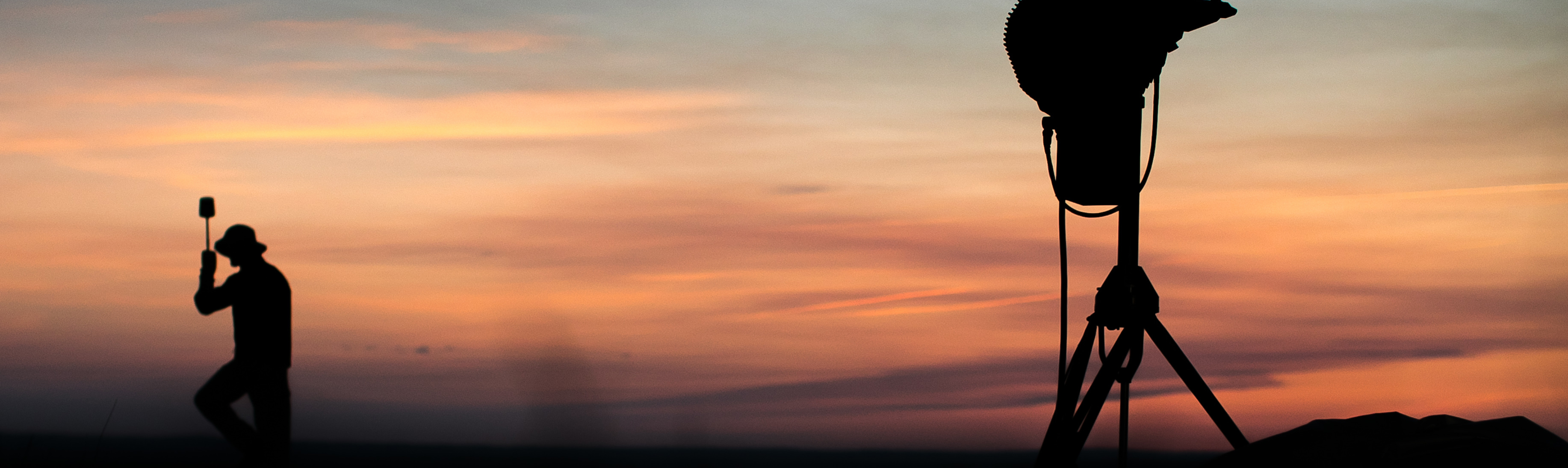 research in the desert with orange sky