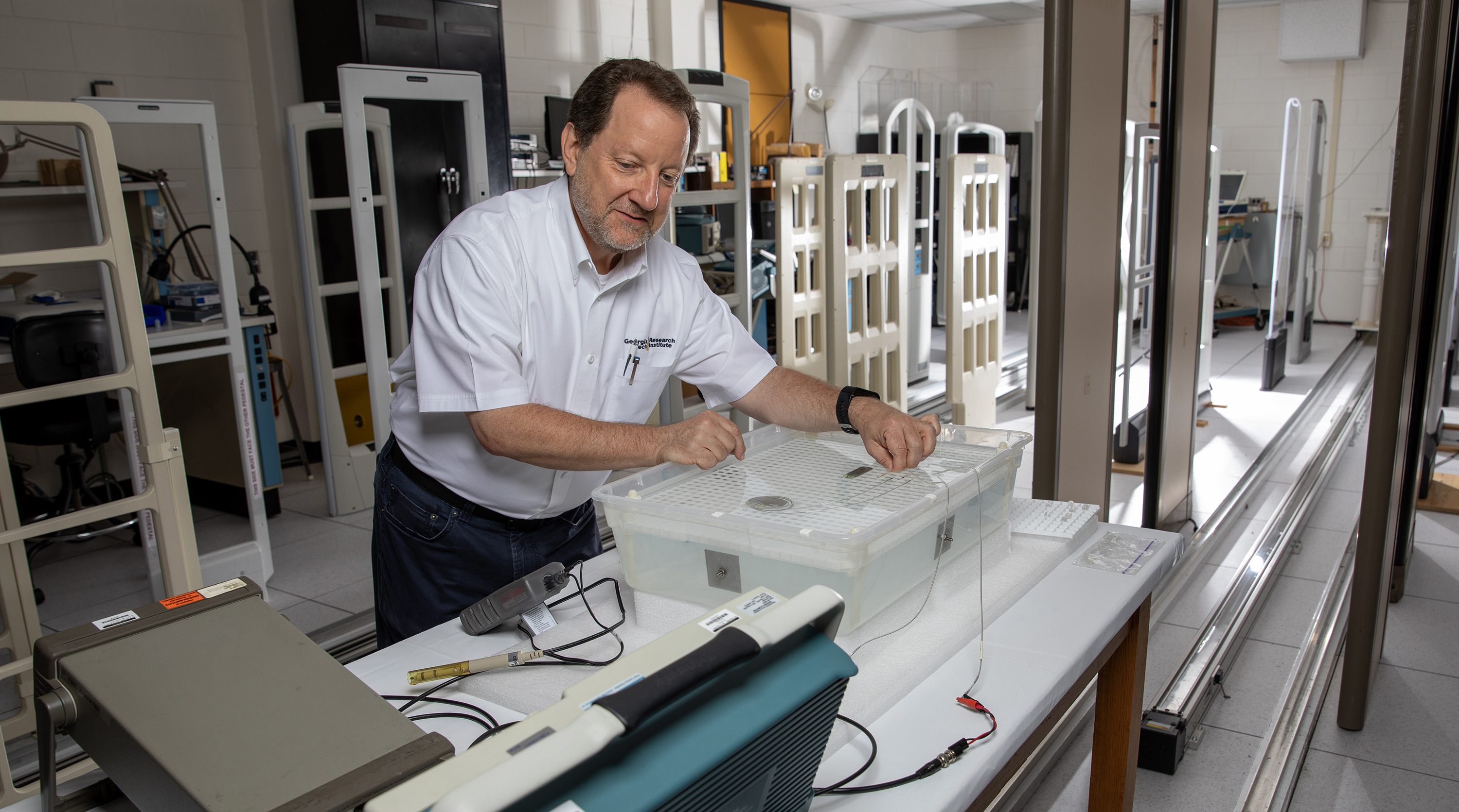 Testing medical devices for interference in a saline tank.