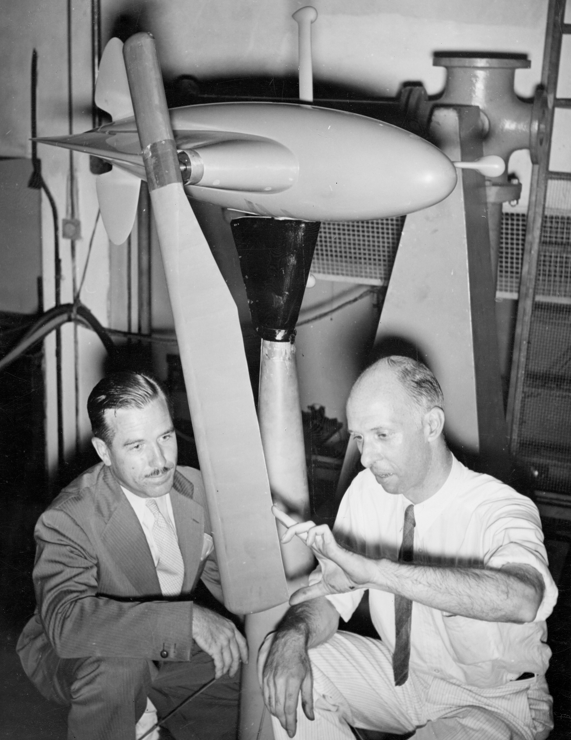 W. Harry Vaugn and Montgomery Knight conduct test on a helicopter rotor