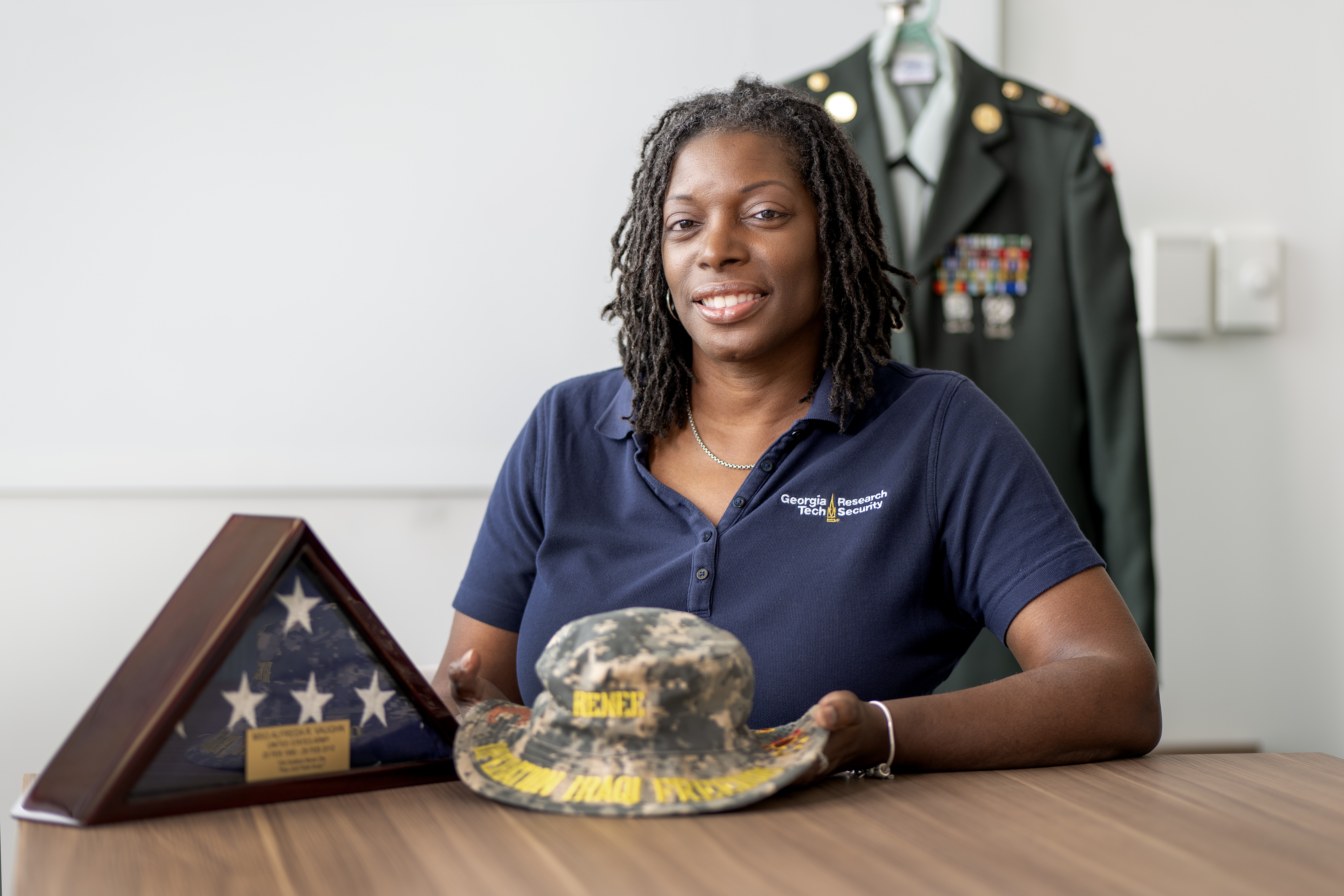 GTRI staff memeber Renee Gourdine poses with military uniform