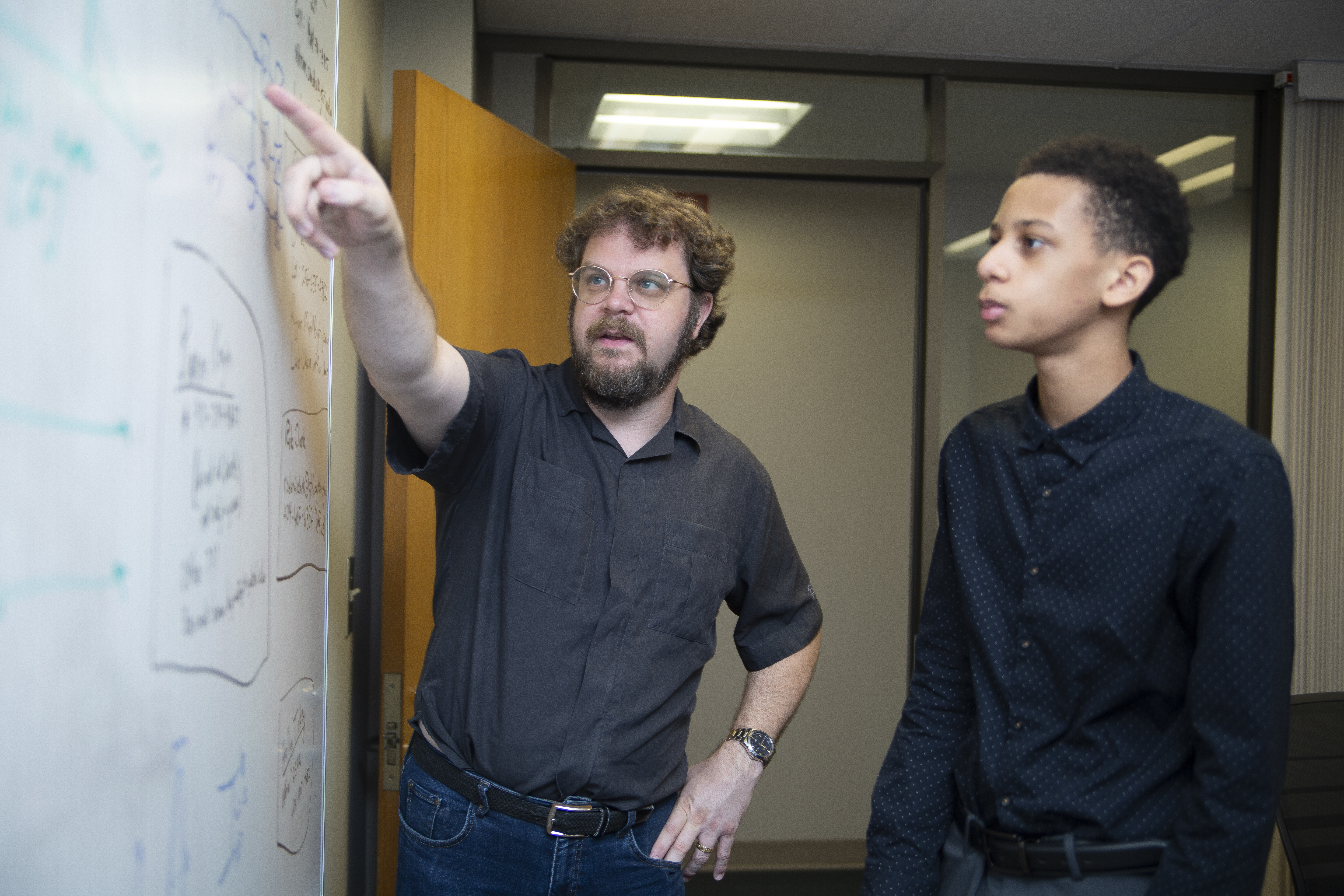 A GTRI mentor works with a high school intern (Photo Credit: Christopher Moore).
