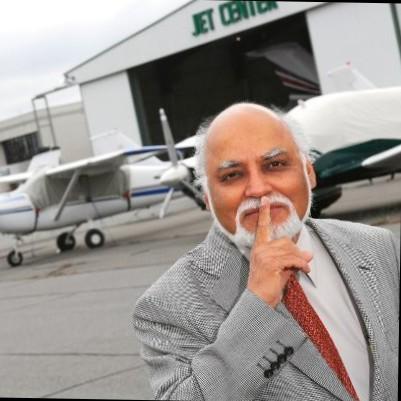 Dr. Krish Ahuja "shushes" jet engine noise.