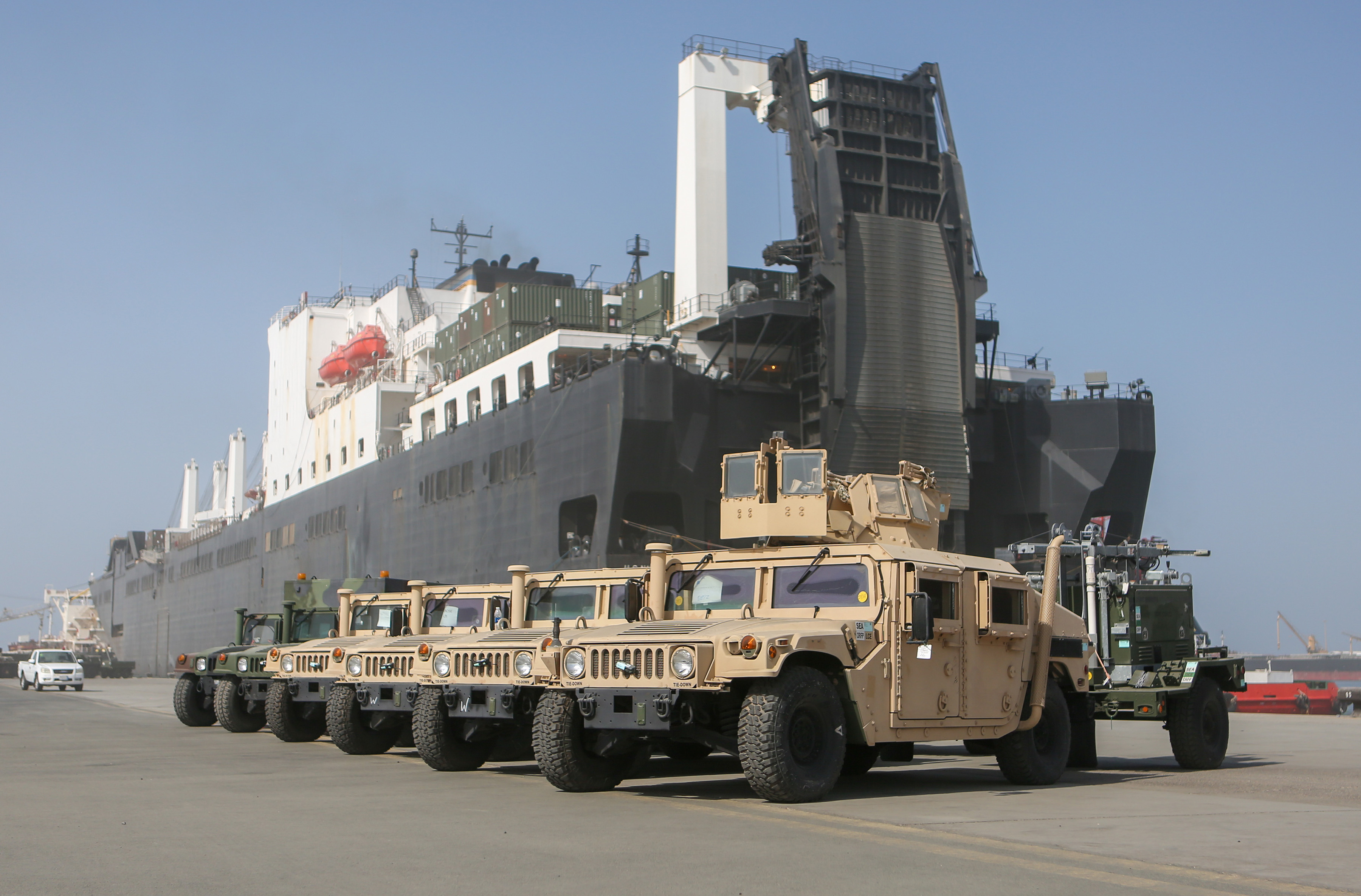 U.S. Marine Corps vehicles are staged for loading