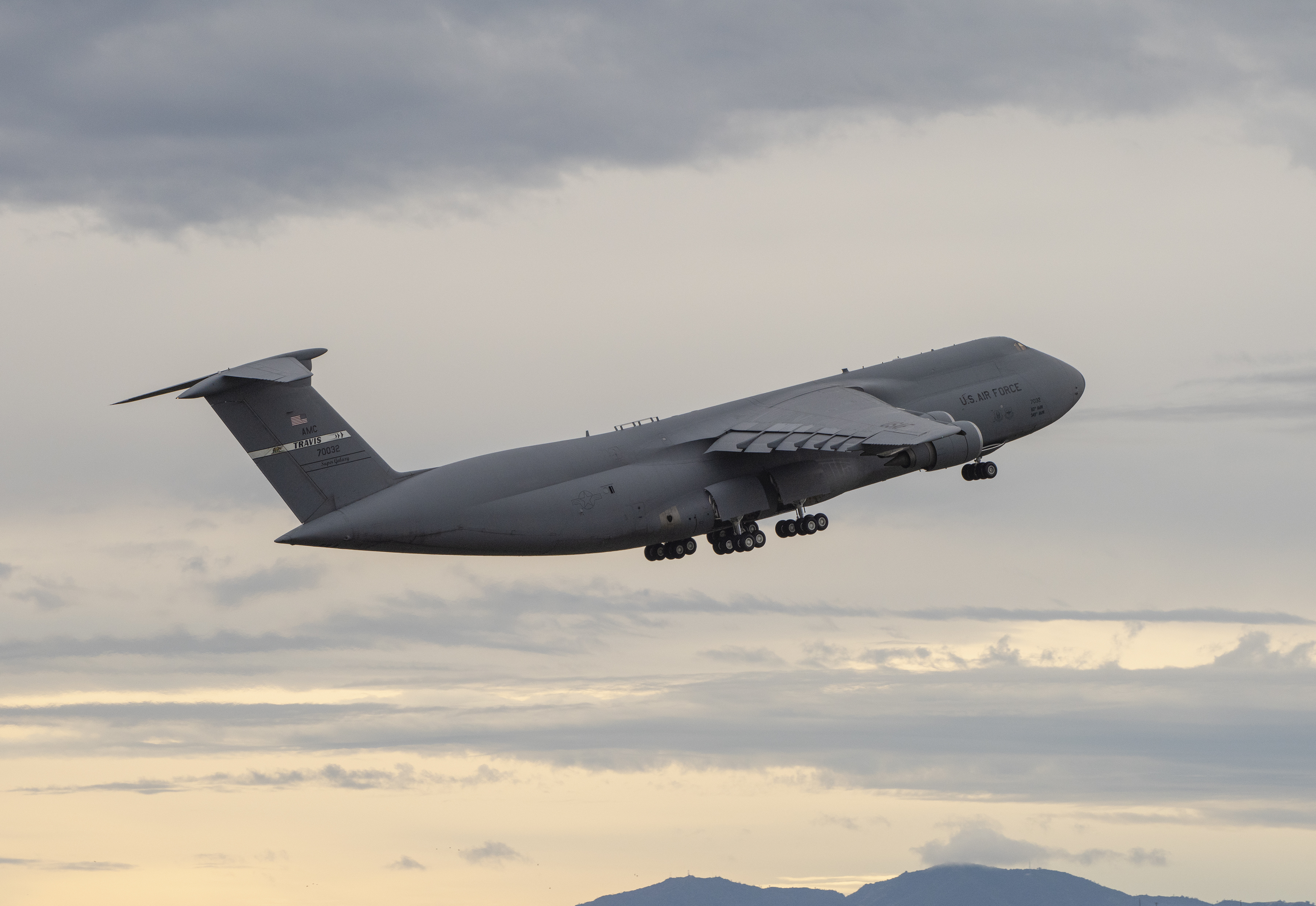 A C-5M Super Galaxy takes off from Travis Air Force Base