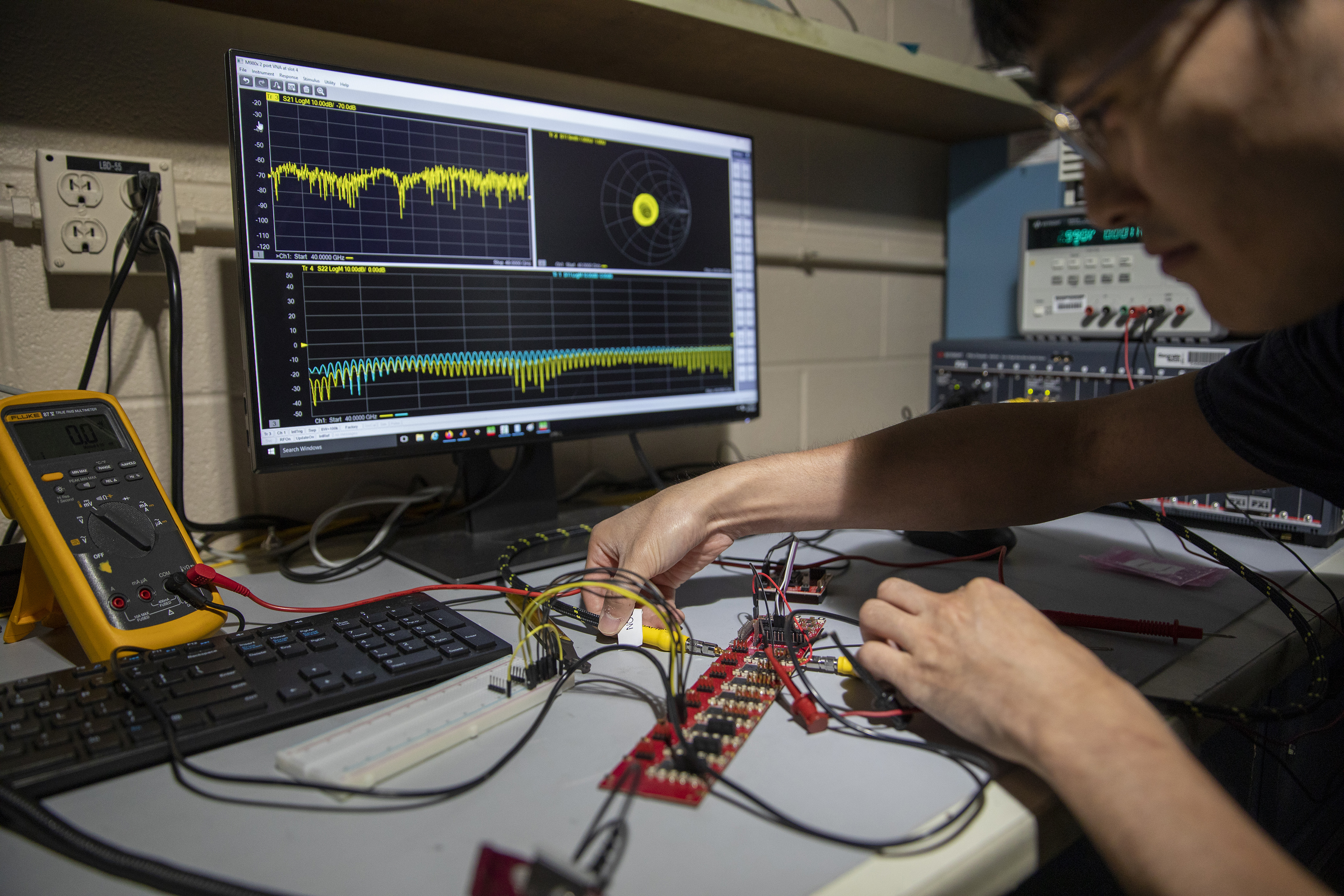 GTRI researchers check an RF test board