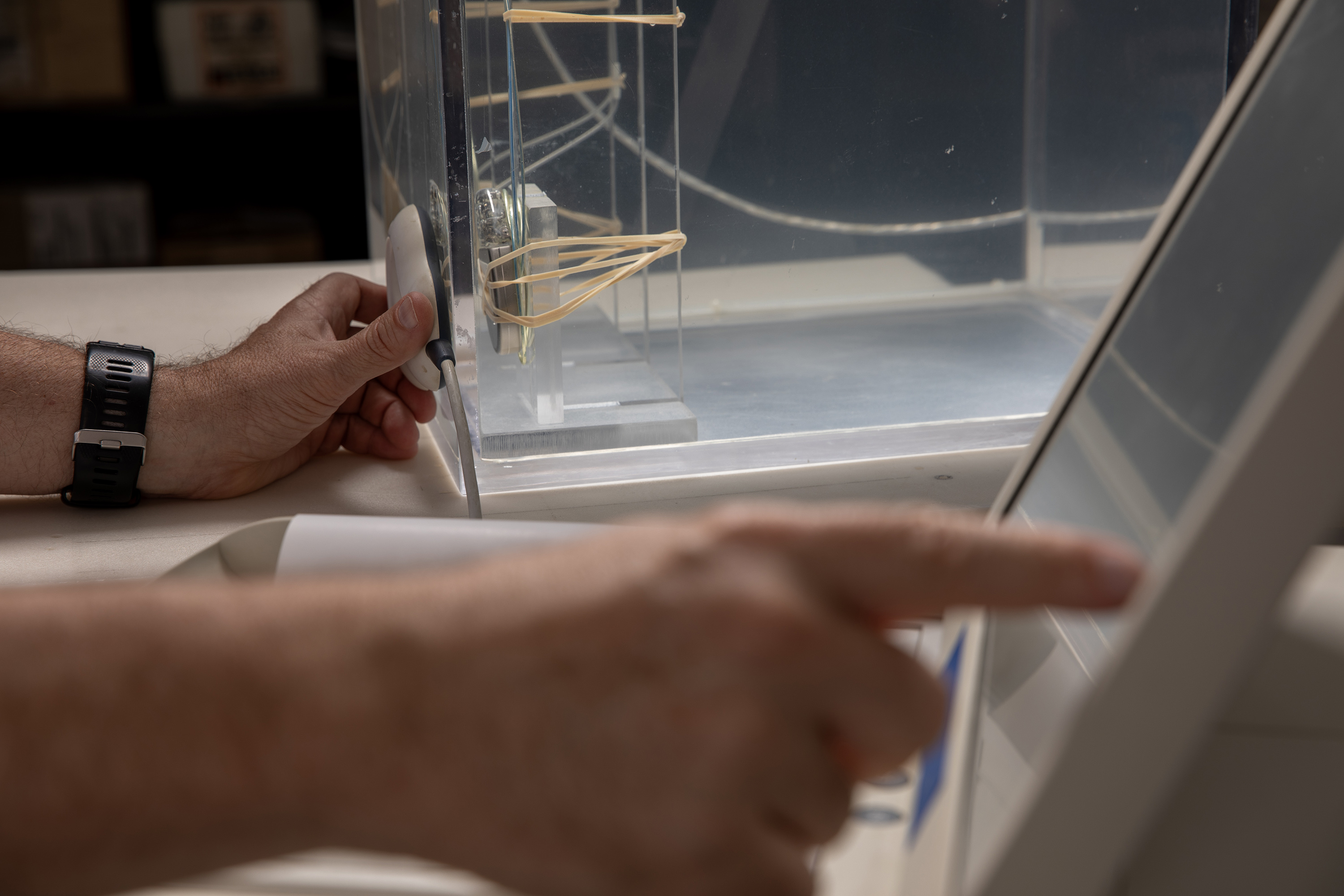 Medical device is prepared for testing in a saline tank.