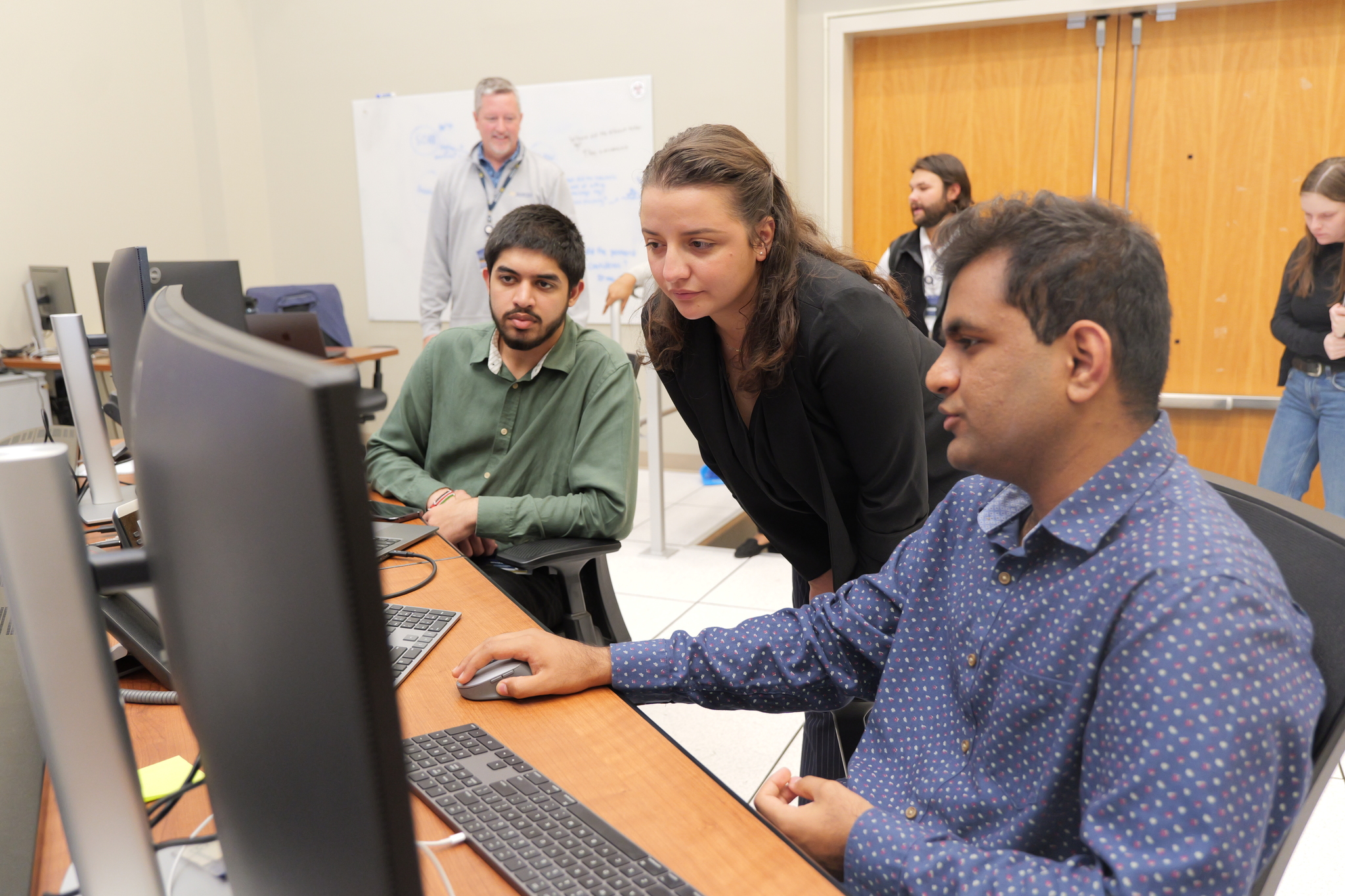 As part of her onboarding, Stephanie toured GTRI facilities and met with personnel involved in GTRI's IT operations, including the Information Security Operations Center (ISOC) team (photo credit: Christopher J. Moore, GTRI).