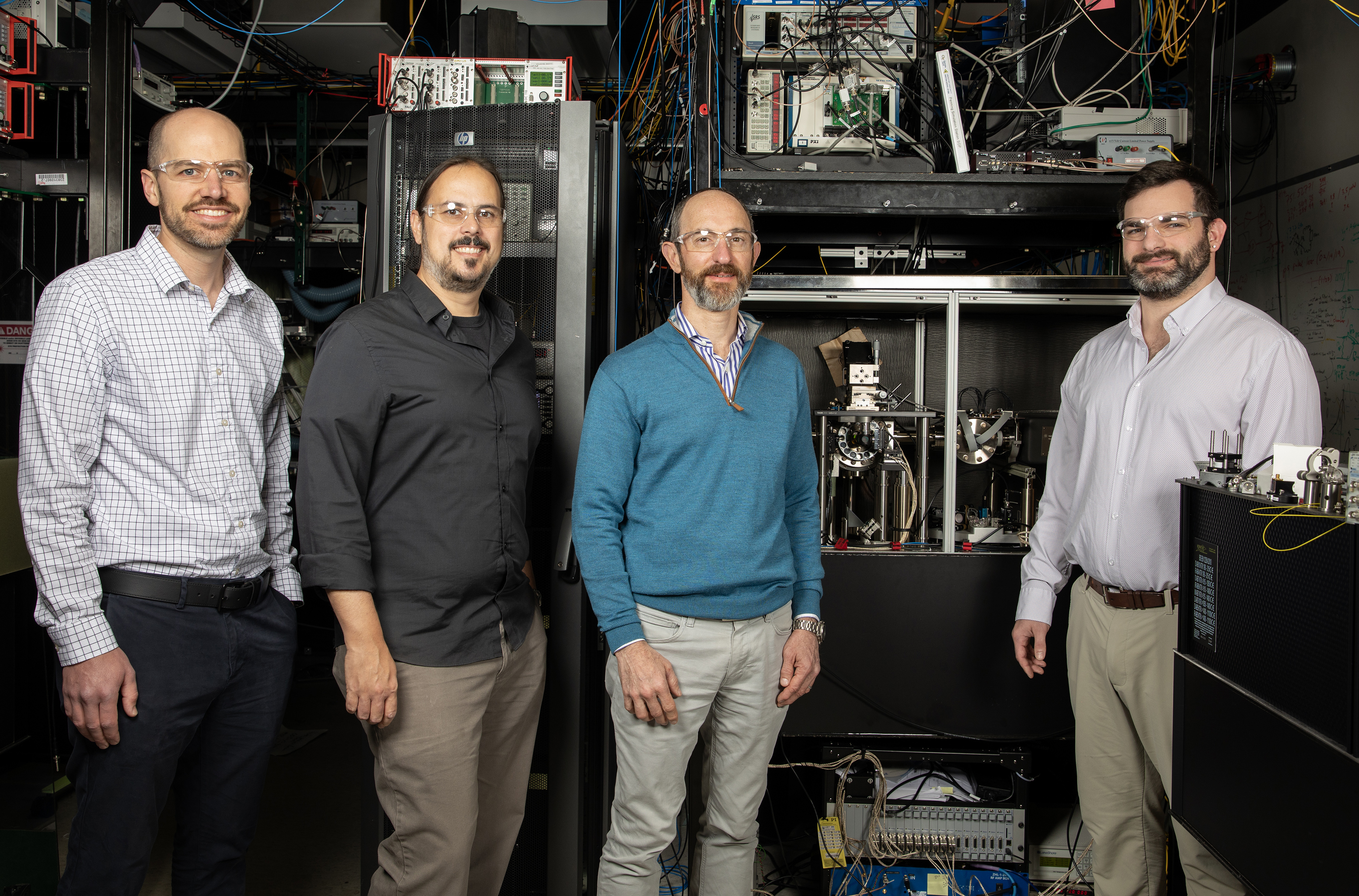 Research team with optical setup