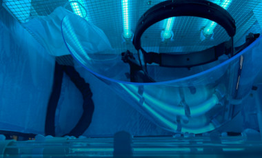 The portable UV disinfection chamber was designed to accommodate at least one face shield, along with multiple face masks. Mercury vapor tubes on both sides provide ultraviolet light to disinfect the PPE. (Credit: Robert Harris)