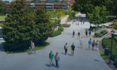 People-walking-along-Skiles-Walkway-next to-Tech-Green