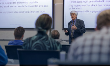 A GTRI researcher teaches a professional education course. 