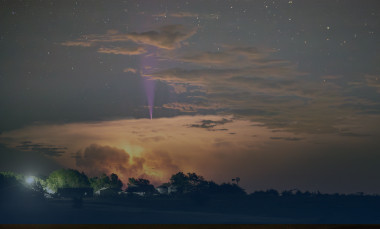 Blue jet rising above a thunderstorm.