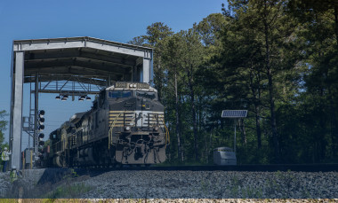 An image of a Norfolk Southern train passing through the company's digital train inspection portal near Jackson, GA.