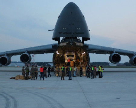 Photo taken at dusk shows components of the ARTS-V1 system loaded into a C-5M Super Galaxy. 
