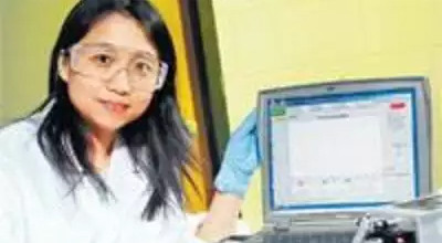 Jie Xu with biosensor.
