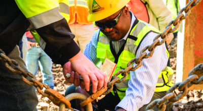 Man with hard had on construction site