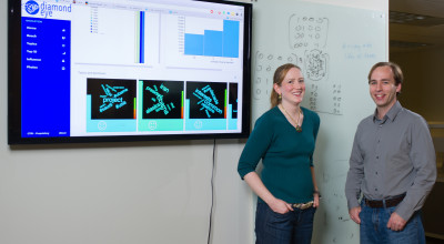 GTRI researchers Amy Sharma and David Ediger are shown with analytics produced by Diamond Eye