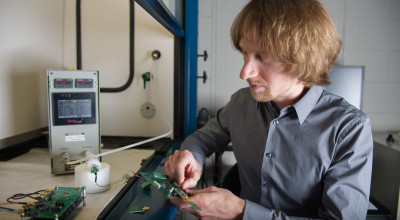 Researcher inspects the RFID 