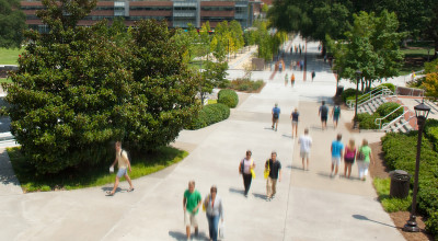 People-walking-along-Skiles-Walkway-next to-Tech-Green