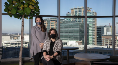 Two Georgia Tech researchers pose for a picture. 