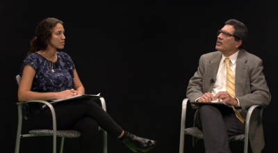 A photo of a panel discussion featuring a GTRI engineer. 