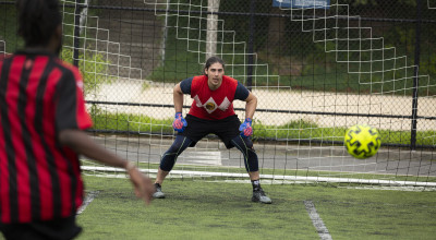 The read team goalie tries to block the other team from scoring. (Photo Credit: Christopher Moore)