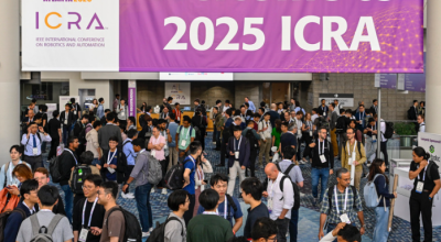 Crowd at entrance to ICRA 2025