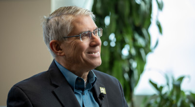 GTRI Director Mike Gazarik seating and smiling during an interview
